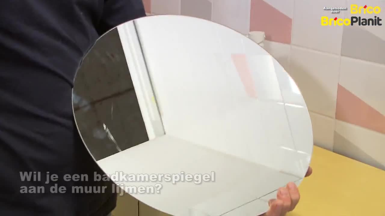Zo lijm je een badkamerspiegel vast